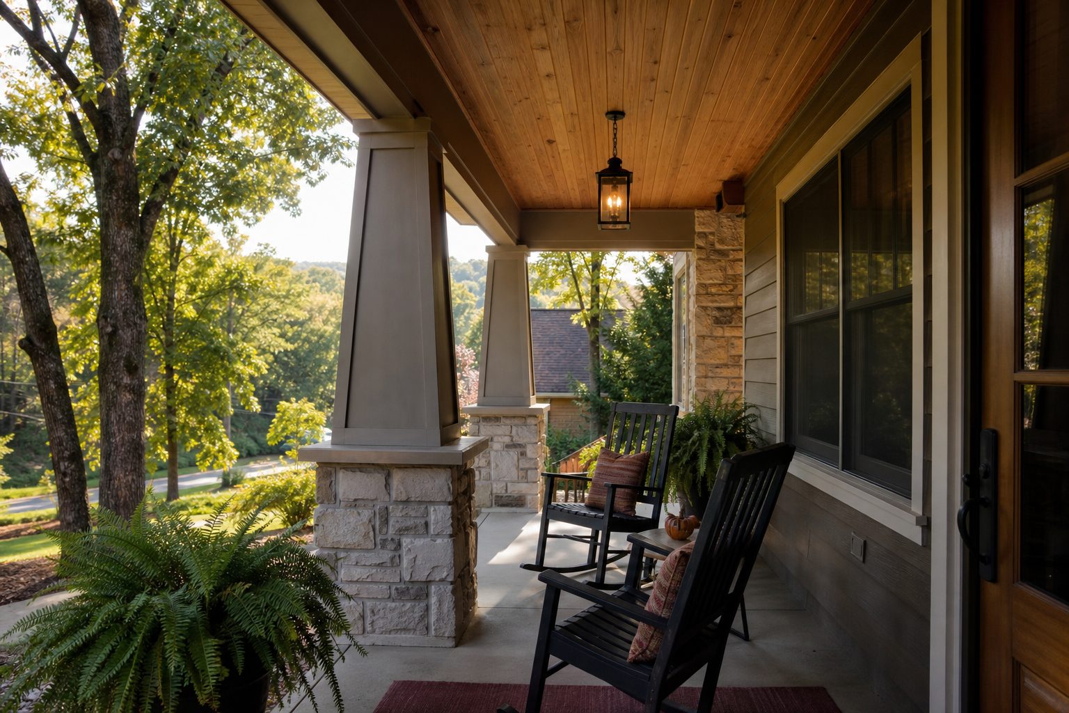 Covered front porch of a Missouri home in afternoon light